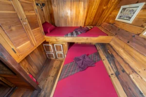 Corner view of a twin cabin aboard Kira Kira showing both single beds