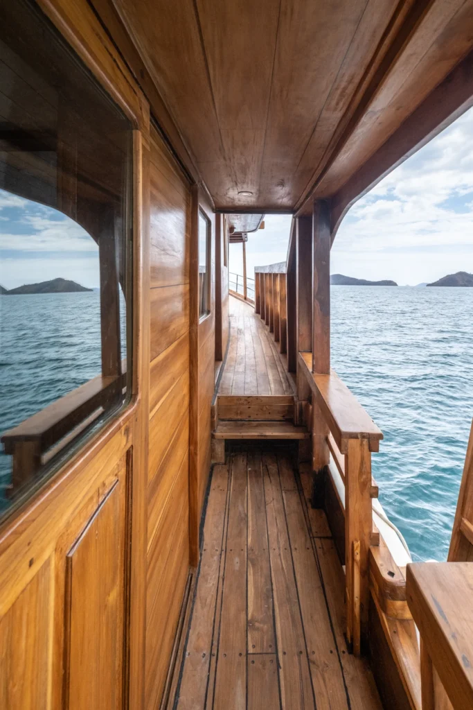 Outdoor wooden hallway aboard La Unua