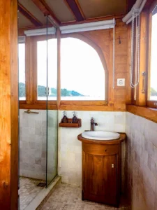 Private bathroom in the panoramic View Cabin aboard La Unua