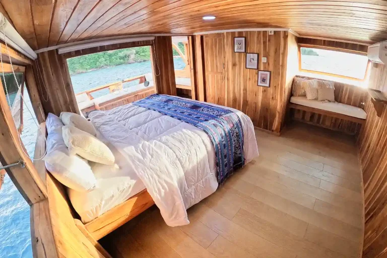 Wide view of the Master Ocean View cabin aboard Malca Voyages