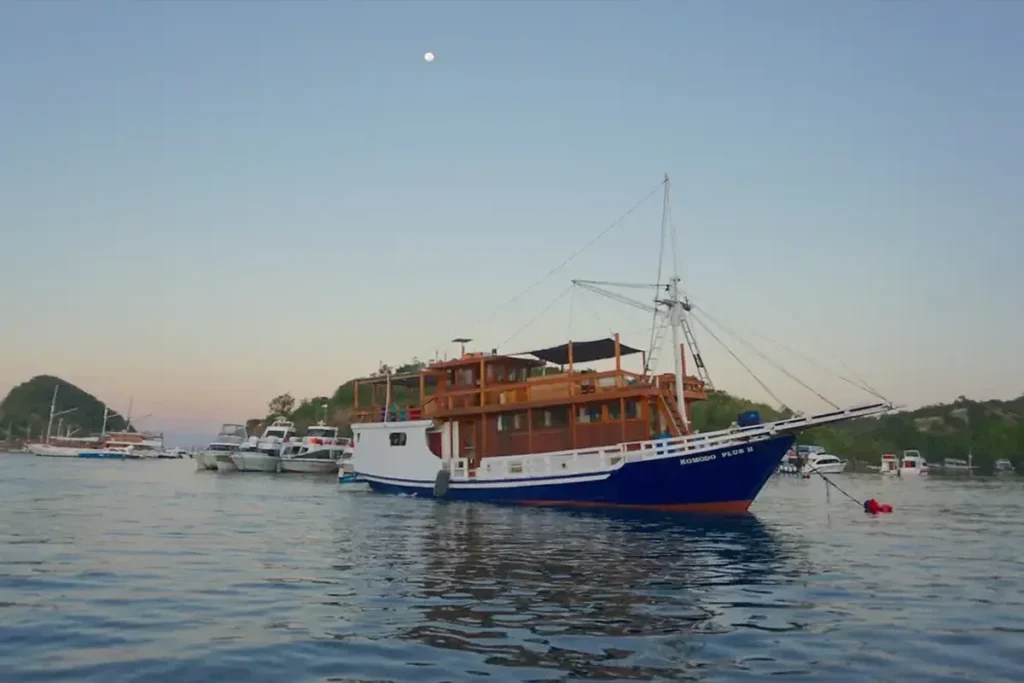 MV NusaTara wooden liveaboard schooner anchored near Labuan Bajo