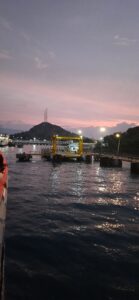 Poto Tano ferry terminal at sunset across the route from Kayangan Harbour