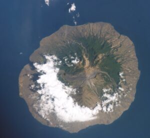 Aerial photograph of Sangeang Api island and its volcanic terrain