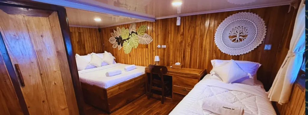 Seamore Papua VIP suite bed beside photos of its ensuite shower and toilet