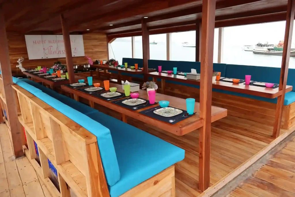 Outdoor dining area aboard Thalassa two