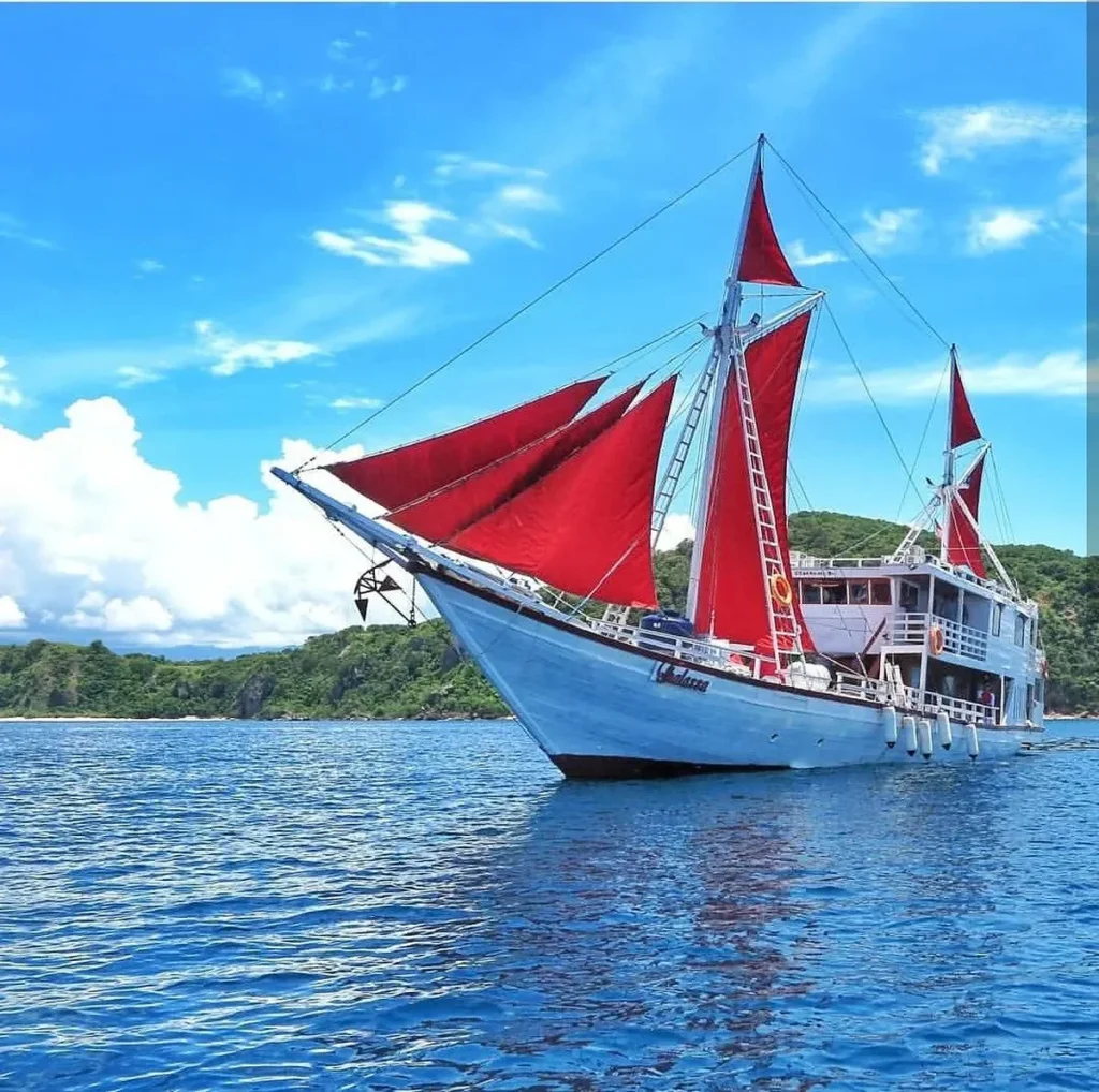 Thalassa one phinisi viewed from the bow while sailing in Komodo
