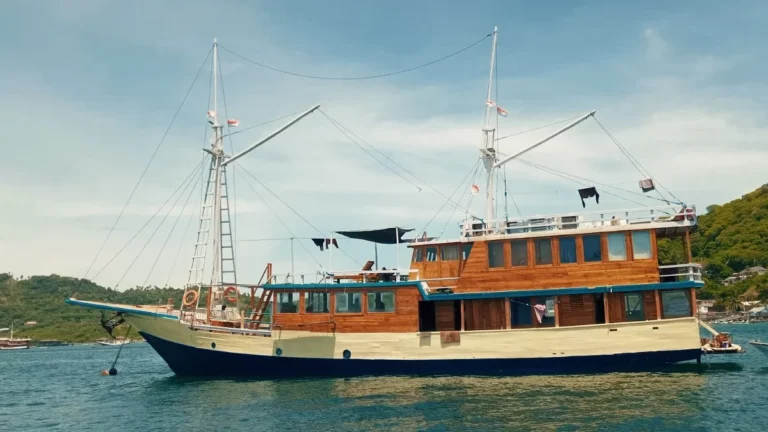 Arumi phinisi side profile at anchor
